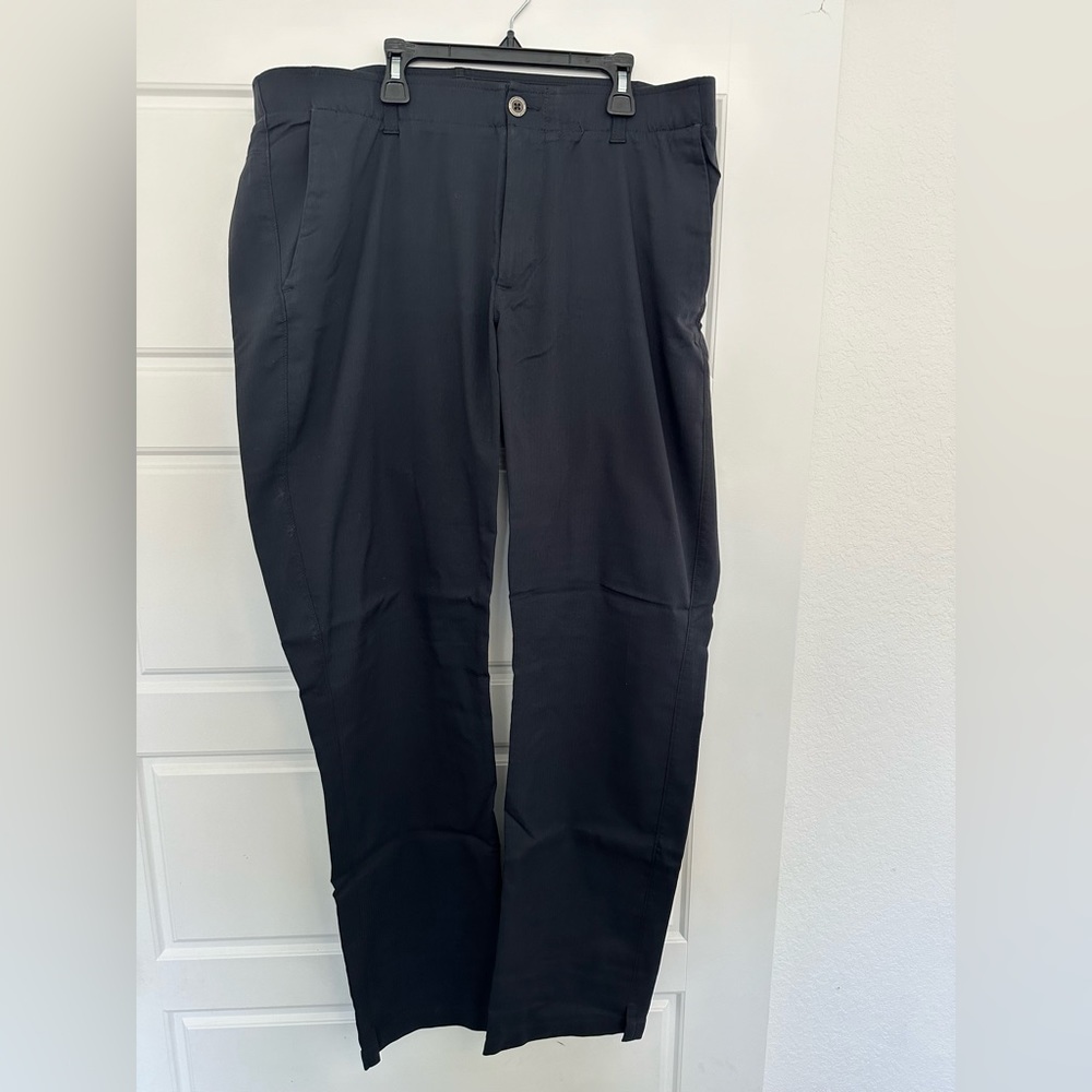 Under Armour men’s black golf pants.  38x34.  Internal grip waistband